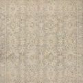 Natural-toned Penny Blue traditional rug with ribbed high-low wool pile and subtle floral motifs