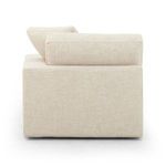 Side view showing the block arm and thick back cushion with square edges in cream performance fabric