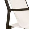 Close focus on backrest fabric stretched over dark oak frame with visible wood grain