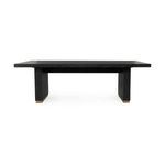 Front view showing the table’s thick rectangular top and two wide legs with light wood bases