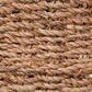 Close-up showing detailed texture and hand-woven pattern of natural seagrass material