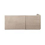 Side profile showing flat side panel of banquette with rattan weave texture