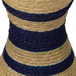 Close-up showing the woven natural fiber texture and painted navy stripes on the table's midsection