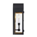 Side profile of matte black arched lantern with one candle-style light and clear glass side panel