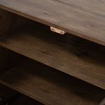 Lifestyle setting of Perrin Sideboard against white molding with fall-toned home decor