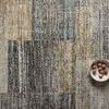 Top view of Soho Grey Gold Rug with small decorative bowls emphasizing pattern colors
