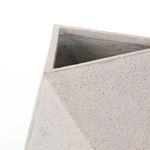 Close-up shot focusing on the upper rim and triangular interior of the planter