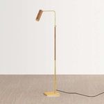 Narragansett floor lamp shown from side with swing arm extended and lamp head angled down