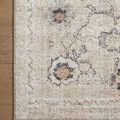 Detailed corner view highlighting floral motif and subtle beige border on wooden floor
