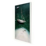 Side angled view of the mounted photograph showing its slim white frame depth and glossy surface