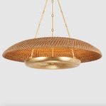 Front view of pendant fully lit showcasing circular rope shade and gold leaf ring diffuser against light background