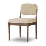 Esther Dining Chair angled three-quarters view highlighting thick cushioned seat and slightly curved backrest