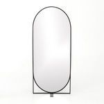 Black metal framed oval floor mirror with a simple rectangular base support