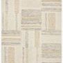 Rectangular modern rug with geometric blocks in slate, olive, and beige tones on wool pile