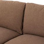 Close-up of upper-back cushions illustrating plush feather-fiber fill in linen cover