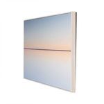 Angled side view revealing thickness and float-mounted framing with visible depth