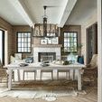 Miller Dining Table styled in rustic dining room with wicker arm chairs and chandelier
