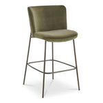 Three-quarter angle view showing contoured seat and angled metal legs with footrest