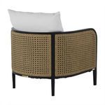 Back view showing curved natural resin wicker and black frame with white cushion
