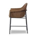 Left side profile highlighting woven texture and iron support frame of outdoor counter stool