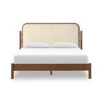 Lifestyle bedroom setting with Caroline Smoked Oak King Bed styled with pillows and neutral bedding