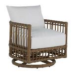 Newport Burlap Barrel Swivel Chair with brown woven rattan frame and white cushioned seat and back