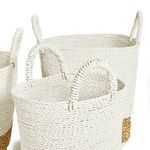 Close-up on handles of Madura Market baskets revealing woven texture detail