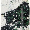Close-up showing curved top and rounded edge of Fossey Object with green and black synthetic stone pattern