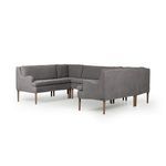 Banquette shown from a three-quarter back angle highlighting overall shape and wood leg finish