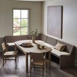 Senna Dining Banquette with cushion detail and rattan weave visible from an elevated angle