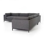 Another close-up of sectional corner cushions emphasizing fabric weave and piping