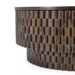 Detailed close-up of the Norwood coffee table's textured block-patterned wooden base