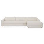 Farrow Sectional sofa in flecked oat upholstery with deep cushions and gentle arm slope on low invisible base