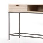 Trey Console Table styled in living room with neutral walls and dark upholstered chair