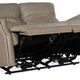 Loveseat reclined with footrests extended and visible metal reclining mechanism