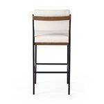 Back of Benton Stool showing white fabric backrest and oak horizontal support detail