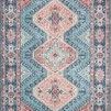 Skye Turquoise Terracotta Rug with old-world diamond and floral medallion design in faded blue and terracotta tones