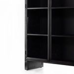Lower section of Breya cabinet showing door frame and base details