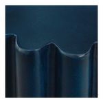 Close-up of rounded ridges and textured matte surface on the side of Taffy Accent Table