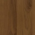 Close-up showing wood grain and small knots in light oak finish on drawer front