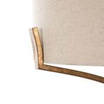 Side close-up showing texture of natural fabric shade and metal frame