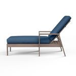 Side view of Laguna Chaise Lounge showing armrest and inclined blue cushion backrest