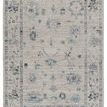 Distressed traditional floral area rug in blue, gray, and cream tones, 9'6" x 12'6" size