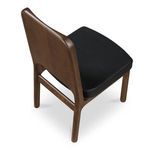 Overhead rear angled view emphasizing walnut wood frame and black vegan leather seat texture