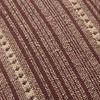 Close-up of burgundy and beige stripes highlighting woven texture and cotton fabric detail