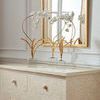 Milford Chest styled with a gold orchid sculpture and mirror in a bright room setting