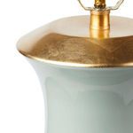 Thiri Lamp in pale celadon glazed porcelain with a gold-finished base and top accents, 28.5 inches tall