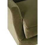 Close-up of plush seat cushion corner with piped edge detail in olive velvet