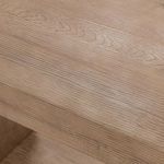 Macro view of the reclaimed pine wood grain pattern and natural finish on the surface