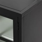 Close-up of door handle with vertical, rectangular black pull design